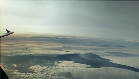 This photo was taken at 40,000 feet, so the curvature formula says that the horizon line is 245 miles, which looking at the land below, looks on target, proving that the Earth is curved.