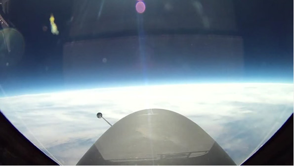 This picture was taken from a U2 spy plane by the manufacturer, Lockheed, at 70,000 feet. It is facing through the windshield, to eliminate the curve created by curved glass on the side of the plane.