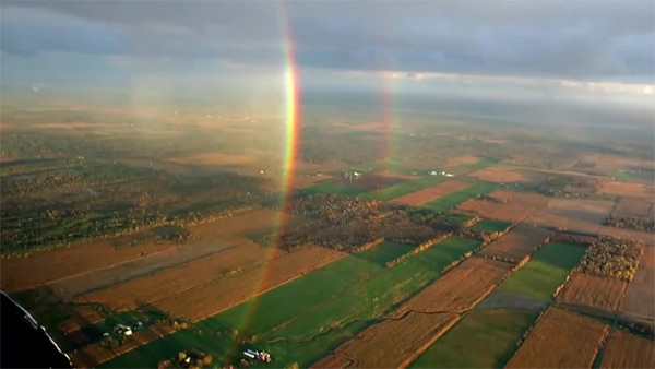 Here is a rainbow taken from an airplane which shows the right lower part of the circle.