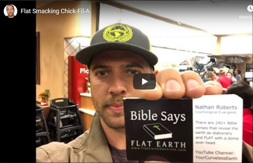 Nathan Roberts hands out Flat Earth business cards, that proclaim that he's a Cosmological Evangelist.