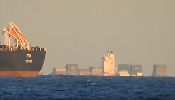 Ship hidden by curve of the water and earth