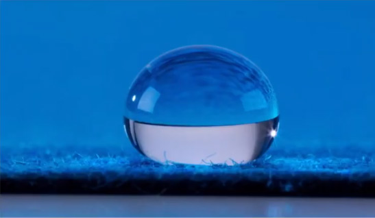 Here's a drop of water that indeed is curving.